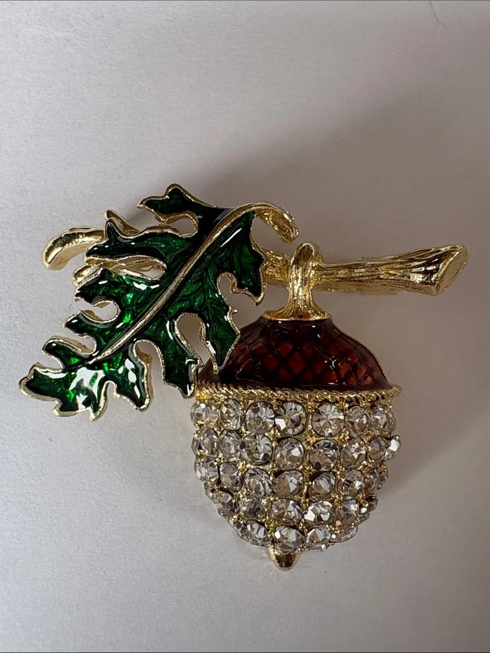 Gold Tone Crystal Acorn Pin with Green Enamel Leaf